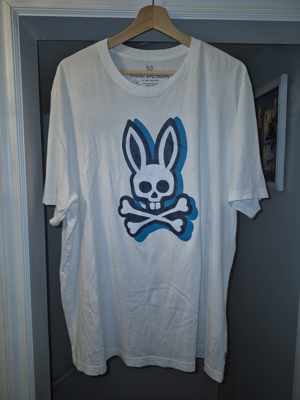 Psycho Bunny White Tee with Navy and Blue Skull Bunny Logo